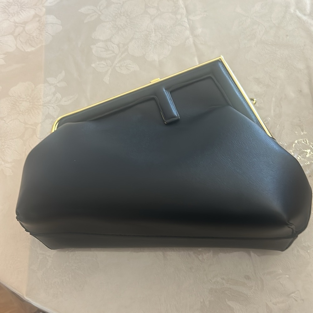 F Clutch bag with strap